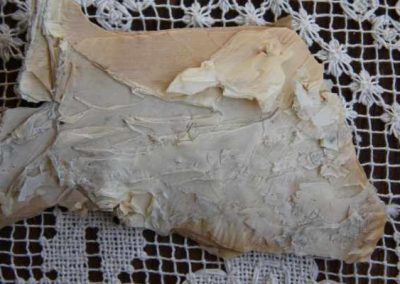 paperbark in the shape of a fish on lace background