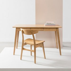 Clear wooden desk with chair