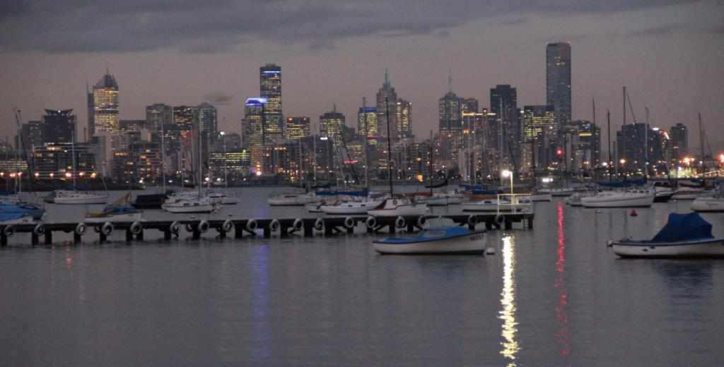 melbourne city from williamstown at dusk